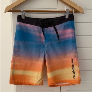 Boys size 10 Quiksilver Blue, Pink & Orange Gradient Boardshorts